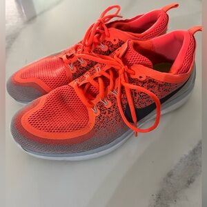 Nike Orange/gray run natural free and flexible tennis shoes